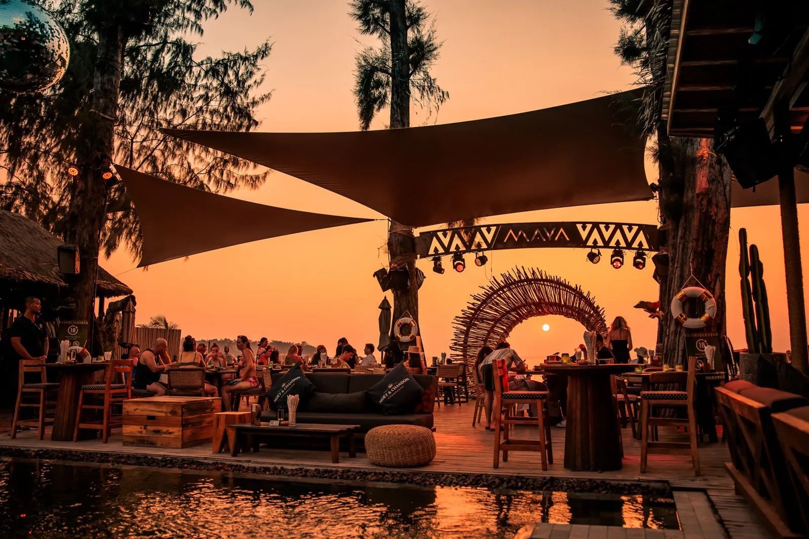 MAYA Phuket beach club golden hour sunset